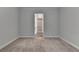 Bedroom with neutral carpet and large closet space at 2505 Whistler Way Ne, Lawrenceville, GA 30043