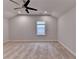Large bedroom features neutral walls and carpet and ceiling fan at 2505 Whistler Way Ne, Lawrenceville, GA 30043