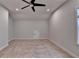 Large bedroom features neutral walls and carpet and ceiling fan at 2505 Whistler Way Ne, Lawrenceville, GA 30043