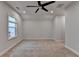 Large bedroom features neutral walls and carpet and ceiling fan at 2505 Whistler Way Ne, Lawrenceville, GA 30043