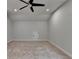 Bright bonus room offers neutral paint, carpet, ceiling fan, and natural light at 2505 Whistler Way Ne, Lawrenceville, GA 30043