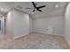 Bright bonus room offers neutral paint, carpet, ceiling fan, and natural light at 2505 Whistler Way Ne, Lawrenceville, GA 30043