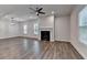 Bright living room with wood floors, fireplace, and many windows at 2505 Whistler Way Ne, Lawrenceville, GA 30043