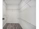 Spacious walk-in closet featuring wire shelving at 267 Rocky Point Rd, Covington, GA 30014