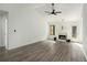 Bright living room features vaulted ceiling, fireplace, and modern flooring at 267 Rocky Point Rd, Covington, GA 30014