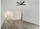 Bright and airy living room featuring modern flooring and neutral paint at 267 Rocky Point Rd, Covington, GA 30014
