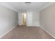 Large carpeted bedroom featuring neutral paint and trim and a closet at 3075 Oakvale Hts, Decatur, GA 30034