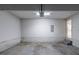Clean garage with an interior entrance and painted walls, perfect for parking and additional storage at 3075 Oakvale Hts, Decatur, GA 30034