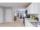 Open kitchen and dining room with bright finishes and modern appliances at 3075 Oakvale Hts, Decatur, GA 30034
