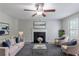 Inviting living room with a fireplace, comfortable seating, and stylish decor at 3075 Oakvale Hts, Decatur, GA 30034