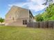 A fenced backyard with a lawn and a view of the home's exterior at 44 Trailview Ln # 78, Hiram, GA 30141