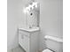 A well-lit bathroom with a vanity, modern fixtures, and a tiled floor at 44 Trailview Ln # 78, Hiram, GA 30141