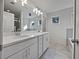 Clean, bright bathroom featuring double sink vanity with quartz countertop and tile flooring at 44 Trailview Ln # 78, Hiram, GA 30141