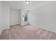 Bright bedroom featuring carpet flooring and a window offering lots of natural light at 44 Trailview Ln # 78, Hiram, GA 30141