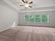 Bright bedroom with a ceiling fan and windows overlooking the trees at 44 Trailview Ln # 78, Hiram, GA 30141