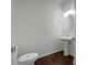 A half bathroom with modern fixtures, a pedestal sink, and a comfort height toilet at 44 Trailview Ln # 78, Hiram, GA 30141