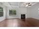 A bright living room with hardwood floors, a fireplace, and coffered ceilings at 44 Trailview Ln # 78, Hiram, GA 30141