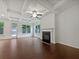 Bright living room with coffered ceilings, a fireplace, and large windows offering plenty of natural light at 44 Trailview Ln # 78, Hiram, GA 30141
