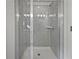 Tiled shower stall with glass door and modern fixtures at 44 Trailview Ln # 78, Hiram, GA 30141
