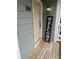 Inviting front entryway with a welcome sign, warm lighting, and a well-maintained wooden porch at 104 Abingdon Way, Atlanta, GA 30328
