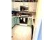 Charming kitchen featuring painted cabinets, modern appliances, and ample counter space at 104 Abingdon Way, Atlanta, GA 30328