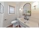 Charming powder room with vintage sink, shiplap walls, and stylish lighting at 138 Hartwood Dr, Woodstock, GA 30189