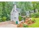 Charming two-story home featuring a well-manicured front yard and a two-car garage at 138 Hartwood Dr, Woodstock, GA 30189