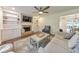Inviting living room with fireplace, custom built-ins, and hardwood floors at 138 Hartwood Dr, Woodstock, GA 30189