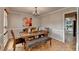 Traditional dining room with wood flooring, chandelier and ample room for entertaining at 1486 Maple Ridge Dr, Suwanee, GA 30024
