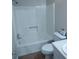 Full bathroom with a combined shower and tub, toilet, and vanity sink at 604 Pepperwood Ln, Stone Mountain, GA 30087