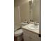Functional bathroom with a tub, toilet, and vanity sink, offering essential amenities at 604 Pepperwood Ln, Stone Mountain, GA 30087