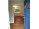 Inviting entryway with hardwood floors and a view into a sunlit living area at 604 Pepperwood Ln, Stone Mountain, GA 30087