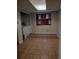 Well-lit laundry room with tiled floors, window with wood blinds, and washer and dryer hookups at 604 Pepperwood Ln, Stone Mountain, GA 30087