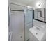 Bathroom features a standup shower, single vanity and white tile at 629 Birchwood Rd, Marietta, GA 30060