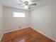 Bedroom with hardwood flooring, neutral walls and ceiling fan at 629 Birchwood Rd, Marietta, GA 30060