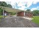 Spacious carport attached to a brick home, offering convenient covered parking at 629 Birchwood Rd, Marietta, GA 30060