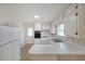 Bright kitchen with white cabinetry, ample counter space, and a convenient layout at 629 Birchwood Rd, Marietta, GA 30060