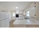 Classic kitchen featuring white cabinets, retro countertops, and vintage appliances at 629 Birchwood Rd, Marietta, GA 30060