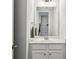Well-lit half bathroom showcasing a white vanity and modern fixtures at 631 Avondale Creek Dr, Decatur, GA 30032