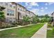 Brick townhomes with landscaped front yards and sidewalks at 631 Avondale Creek Dr, Decatur, GA 30032