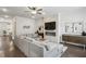 Inviting living room showcasing a fireplace, hardwood floors, and modern decor at 631 Avondale Creek Dr, Decatur, GA 30032