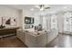 Bright living room featuring hardwood floors, modern fireplace and stylish furnishings at 631 Avondale Creek Dr, Decatur, GA 30032