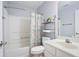 Bathroom featuring a shower-tub combination and functional sink at 174 Saint Georges Ct, Suwanee, GA 30024