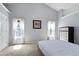 Bright bedroom with neutral colors, high ceilings, and carpet at 174 Saint Georges Ct, Suwanee, GA 30024