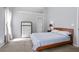 Comfortable bedroom with neutral tones and natural light at 174 Saint Georges Ct, Suwanee, GA 30024