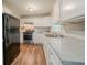 Updated kitchen features white cabinets, modern appliances, and sleek countertops at 3731 Adkins Nw Rd, Atlanta, GA 30331