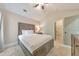 A lovely bedroom with a wooden bed, ceiling fan, and a door to a walk-in closet at 4230 Old Cherokee St, Acworth, GA 30101