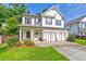 Inviting two-story home with a covered porch and a well-maintained front yard at 4230 Old Cherokee St, Acworth, GA 30101