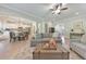 Open-concept living room with hardwood floors and seamless flow to the dining area at 4230 Old Cherokee St, Acworth, GA 30101