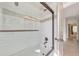 Modern shower featuring white subway tile, glass door, and stylish fixtures for an elegant bath at 4230 Old Cherokee St, Acworth, GA 30101
